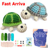 A DIY crochet kit for amigurumi animals featuring a turtle, with yarn and tools.