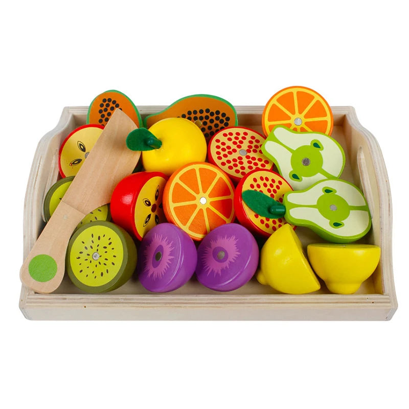A wooden magnetic fruit and vegetable cutting play set featuring various colorful, shaped fruits and vegetables.