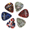 A collection of six Alice celluloid guitar picks in various shades of red, black, and green.
