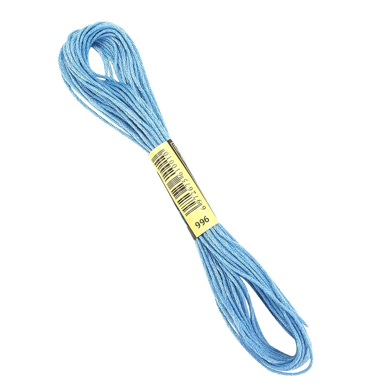 A spool of vibrant blue organic cotton embroidery floss for cross stitch and crafts.