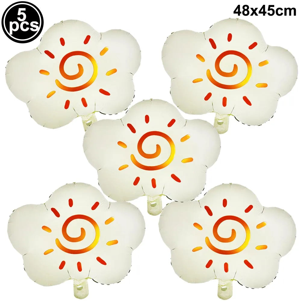 Five white foil balloon planes with orange swirl designs for birthday party decor
