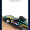 A blue and green remote control racing car is driving on a dirt track.
