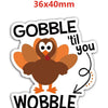 A sticker featuring a cartoon owl with brown and orange feathers and a red beak, with the text GOBBLE and WOBBLE.