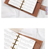 Brown leather habit tracker refill pages for planners showing monthly tracking grids.