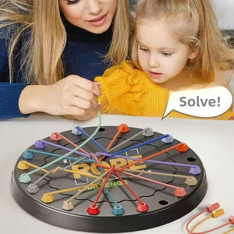 A children's educational logic toy called Rope Tangle Challenge featuring a black disk with colored ropes and wooden pieces.