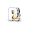 A personalized sterling silver letter R charm with a heart accent, set against a black background.