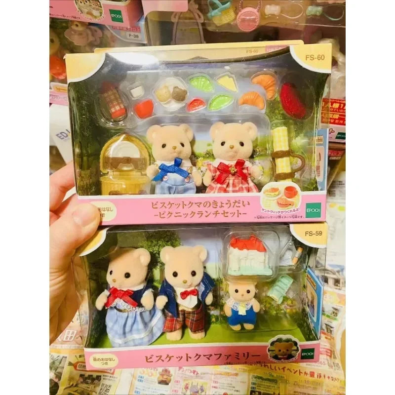 A set of two Sylvanian Families Cookie Bear twins, including accessories and packaging.