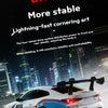 A white 4WD RC drift car with LED lights is shown in a nighttime city setting.