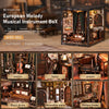 A DIY book nook kit featuring a European melody musical instrument box with detailed miniature furniture and lighting.