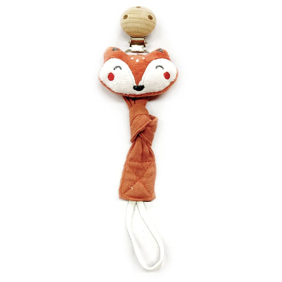 An elephant pacifier holder featuring a brown fox head and a tan fabric strap with a white tip.