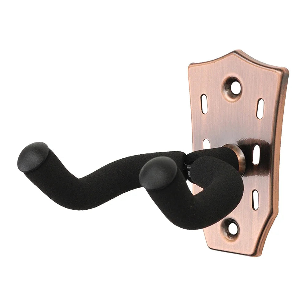 A copper-toned wall mount hanger for guitars with a black padded yoke.