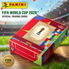 Box of FIFA World Cup 2026 official trading cards featuring football players on a green field background