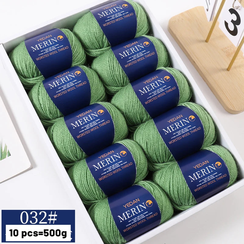 A box of YEDAN MERIN wool thread yarn in green, packaged for knitting projects.