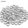 A pile of clear crystal rondelle spacer beads for jewelry making