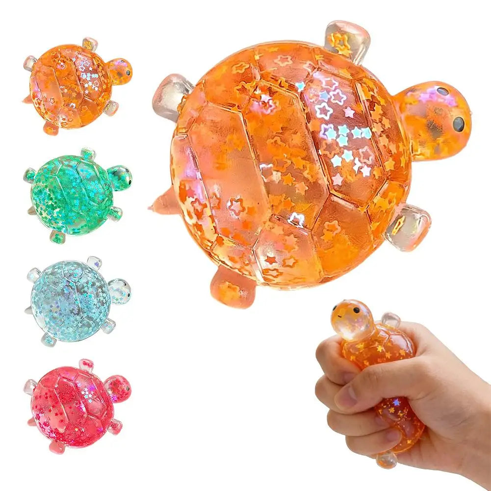 A collection of colorful squishy star turtle stress relief fidget balls, including orange, green, blue, and pink varieties.