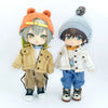 Two 1/12 scale dolls dressed in casual outfits featuring denim jackets and knit hats