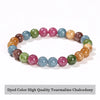 A bracelet made of dyed color high quality tourmaline chalcedony stones in various shades of pink, green, and blue.