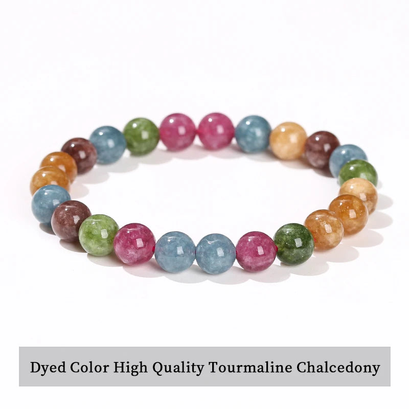 A bracelet made of dyed color high quality tourmaline chalcedony stones in various shades of pink, green, and blue.
