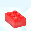A red building block with a circular indentation marked 5mm, shown against a light blue sky background.