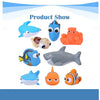 A collection of soft rubber bath toys including a clownfish, shark, and turtle, used for sensory development.