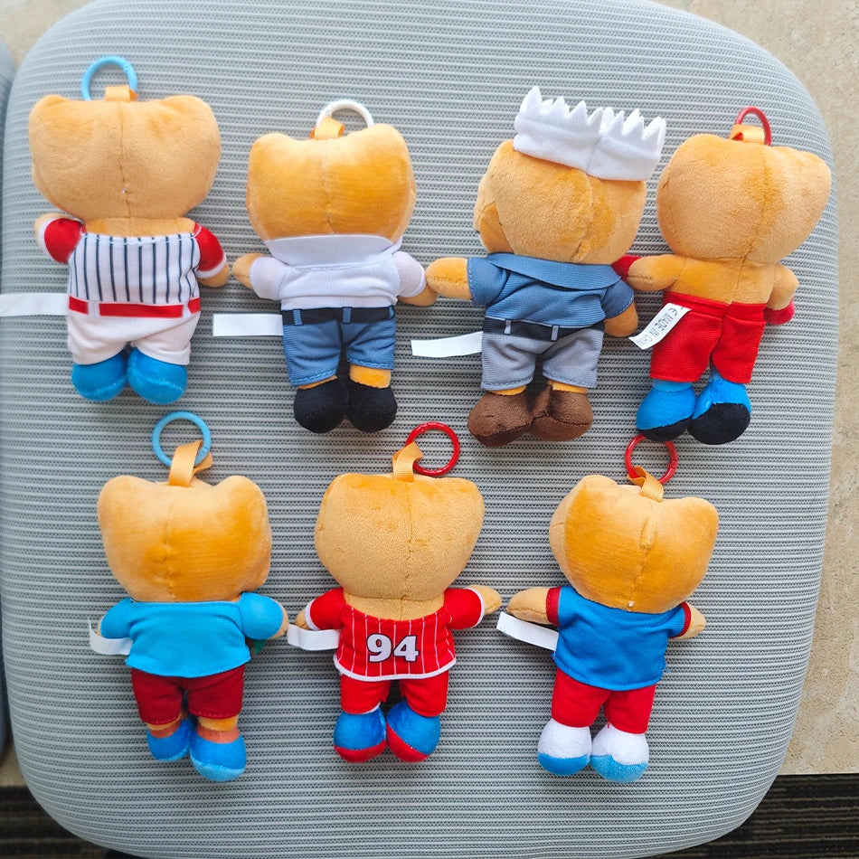 A collection of Bad Bunny El Sapo Concho plush toys in various colors and outfits.