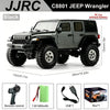 Black JJRC C8801 Jeep Wrangler RC car with remote control and battery