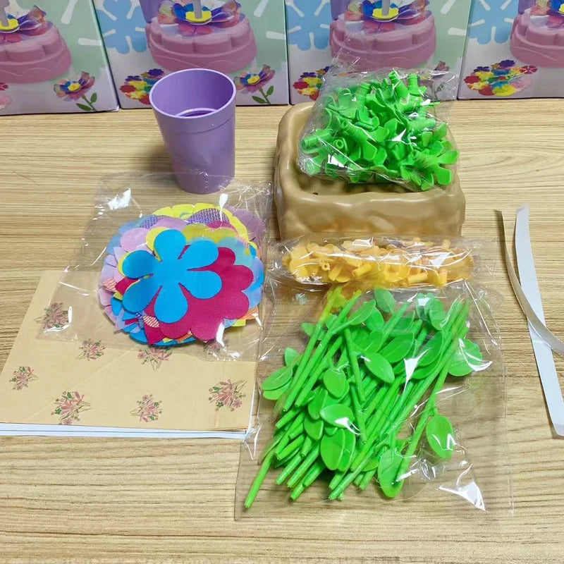 A craft kit containing green fabric flowers and other materials for a DIY bouquet project.