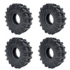 Quatre vues de roues en caoutchouc noir souple conçues pour voitures de crawl RC.