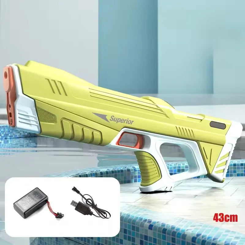 A yellow electric automatic water gun with a white grip and orange accents is shown on a tiled surface.