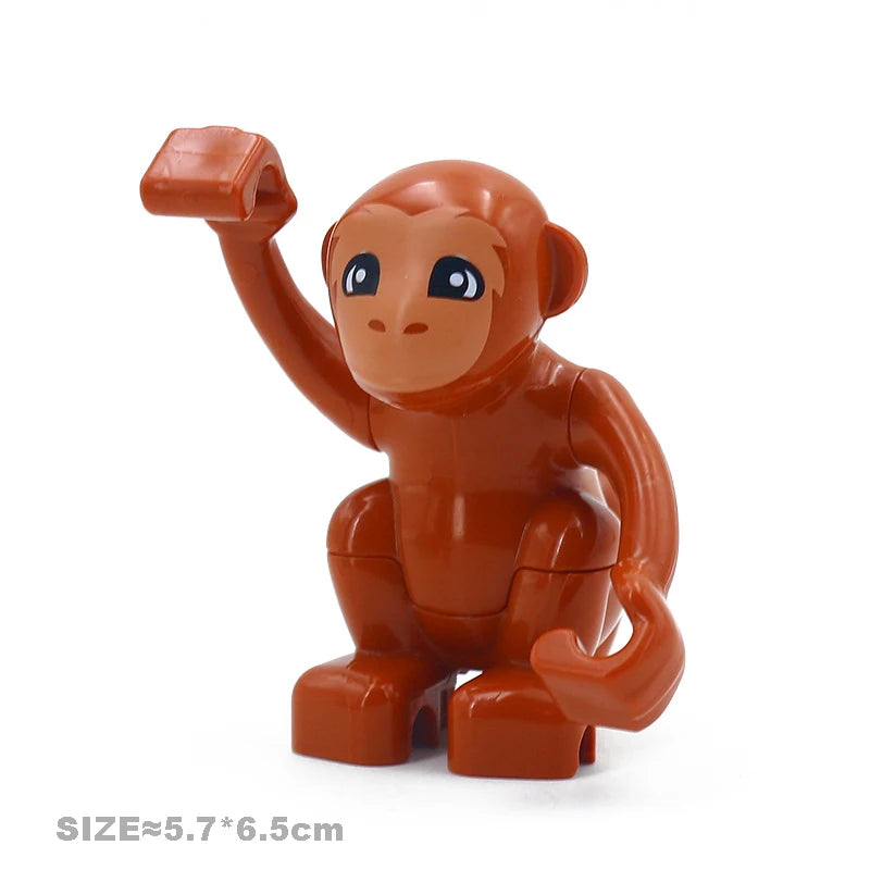 An orange plastic building block figure of a monkey, part of a zoo animal set.