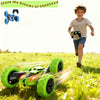 A boy is running while a green 360° flipping stunt car with LED lights moves across the grass.