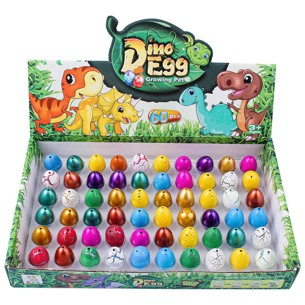 A box of Dino Egg Growing Pet toys featuring various colored dinosaur eggs and a plastic dinosaur figure.