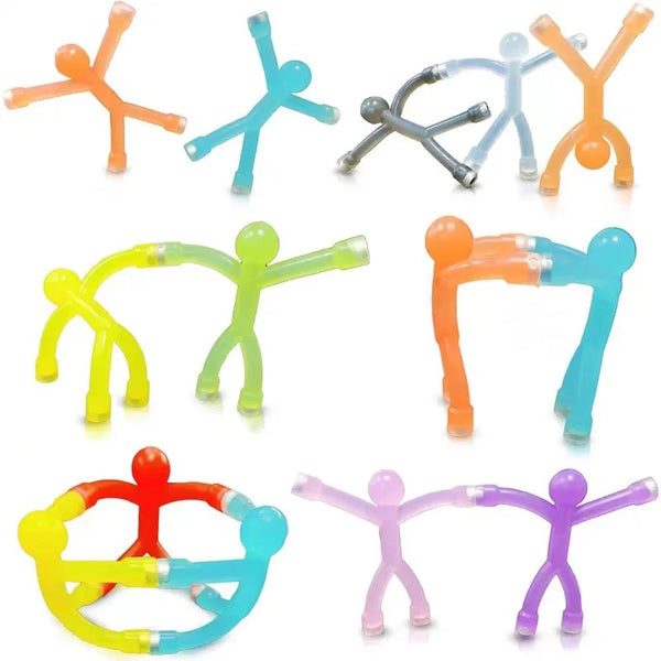 A collection of colorful magnetic humanoid toys in various shapes and colors.