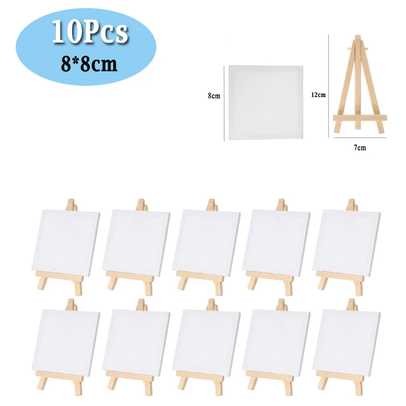 A set of ten mini wooden easels with white canvases for kids art projects.