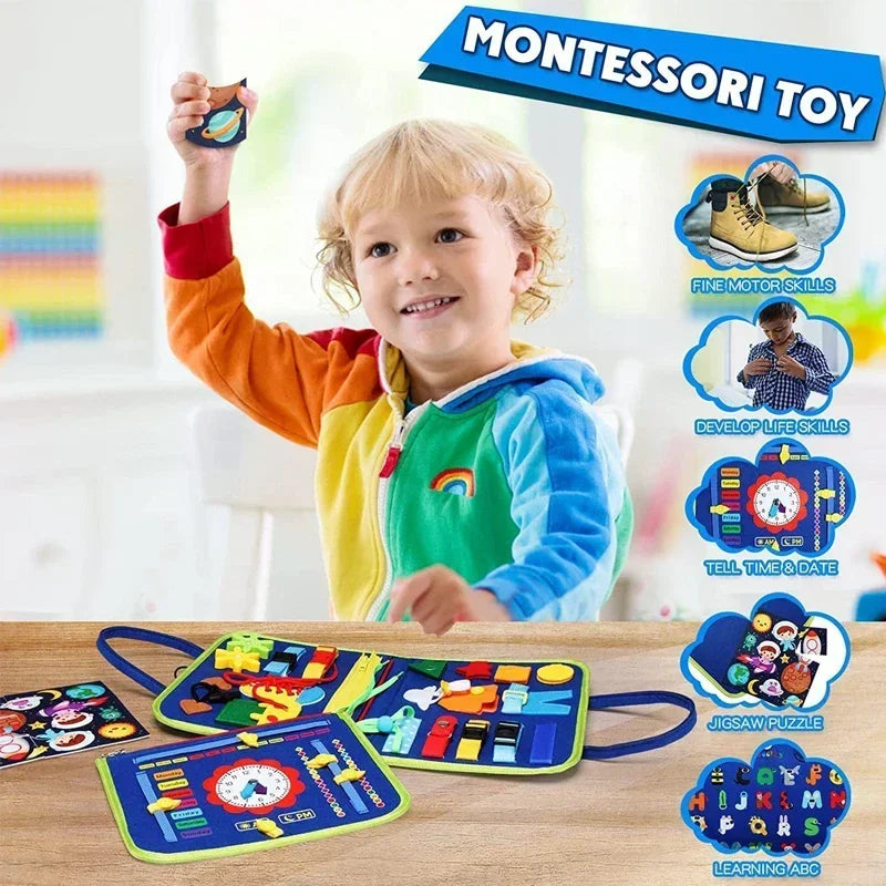 A toddler is holding a Montessori felt activity busy book with a dinosaur theme, surrounded by related learning materials.