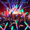 A crowd raises glowing LED foam sticks during a night light party concert performance.
