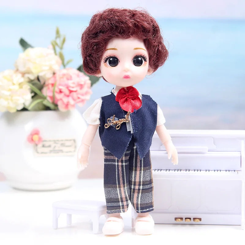A 17cm articulated princess doll with a red floral dress and plaid pants standing next to a white vase of flowers.