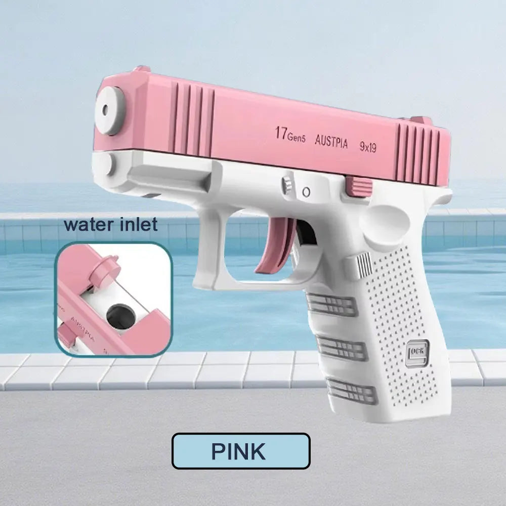 A pink tactical water blaster pistol is shown resting on a tiled surface near water.