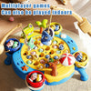 A colorful magnetic fishing game set with various plastic fish and accessories being played indoors.