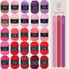 A collection of pink, red, and purple milk cotton yarn skeins for knitting and crochet projects.