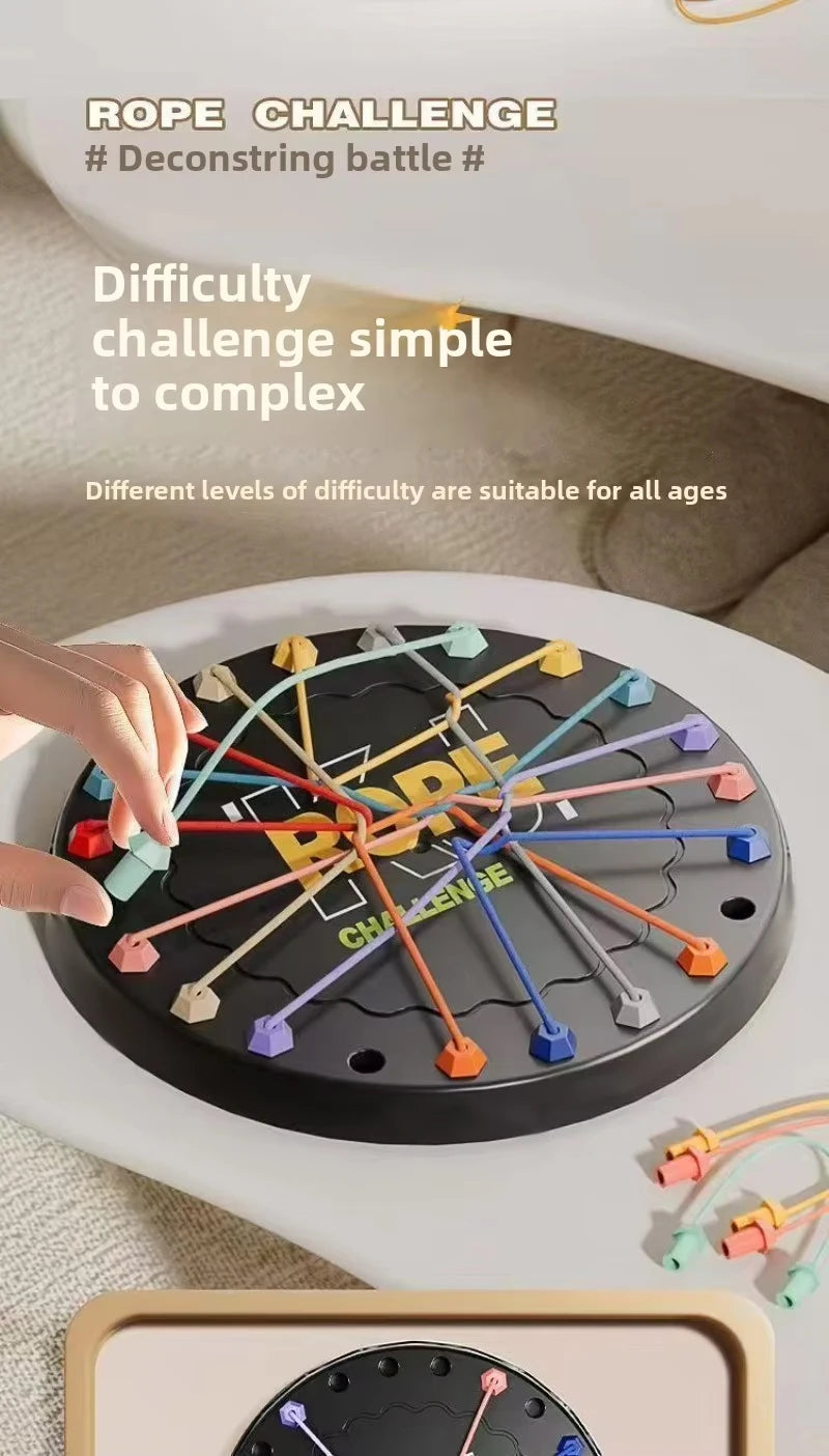 A hand is manipulating a black puzzle board with colored ropes to create a tangle challenge for kids.