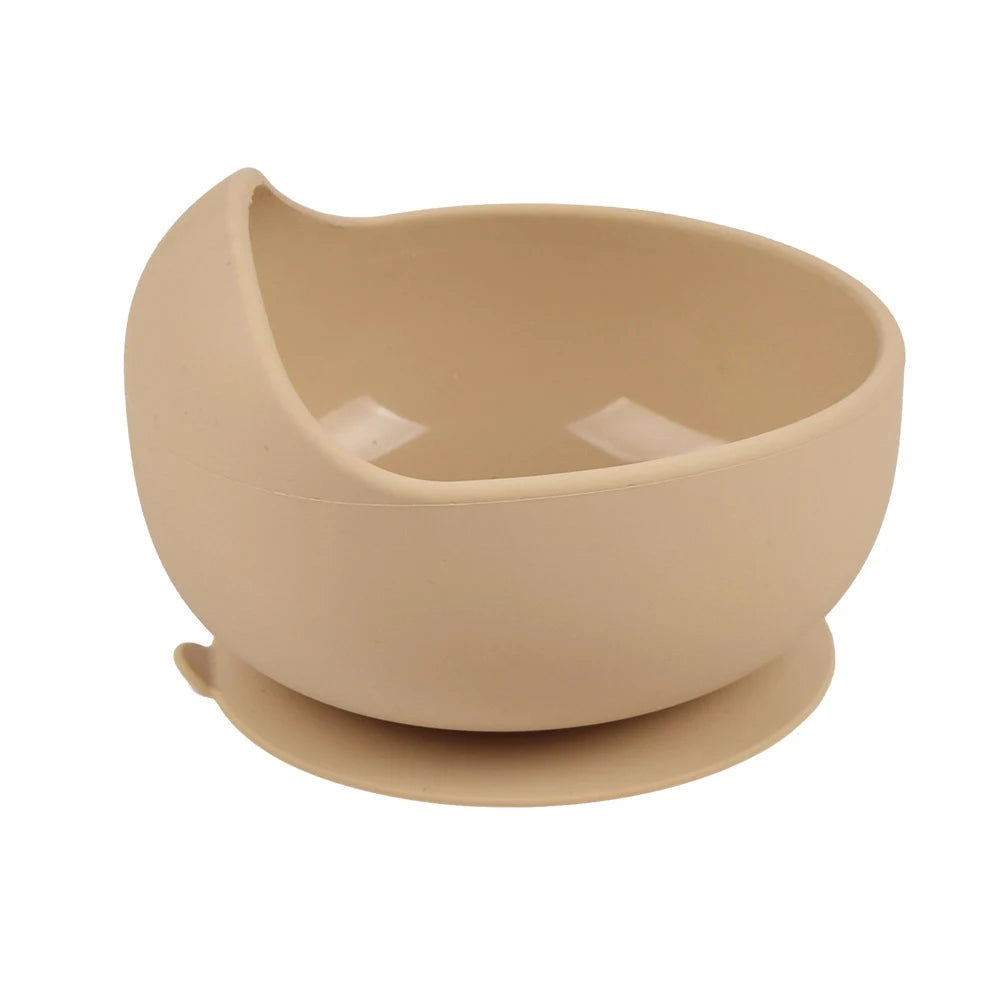 Set de bol et assiette en silicone beige pour tout-petits.