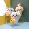 A collection of three soft, cute Chiikawa Usagi plush toys displayed on a clear acrylic stand.
