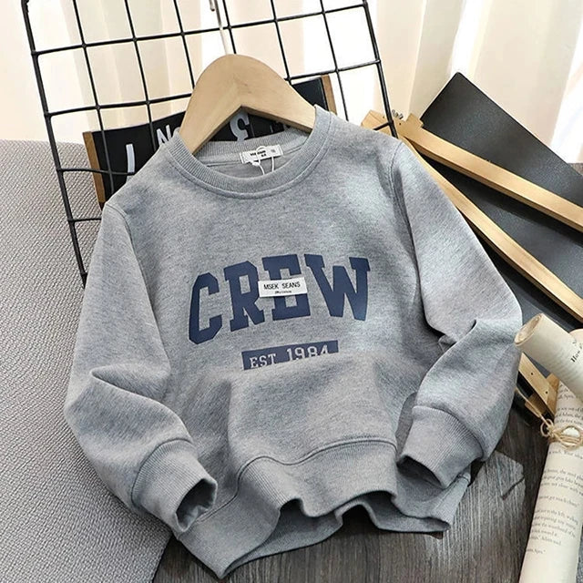 A gray crewneck cotton pullover sweatshirt displayed on a wooden hanger.