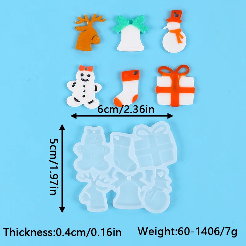 Silicone molds of Christmas figures including reindeer, snowmen, and gift boxes for jewelry and craft projects