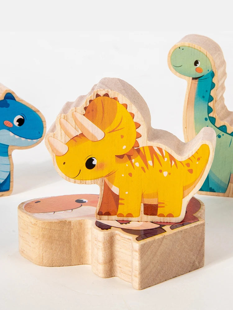A set of wooden dinosaur stacking blocks featuring a yellow dinosaur and a green dinosaur.