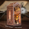 A detailed miniature magic library box featuring ornate wooden furniture and decorative elements.
