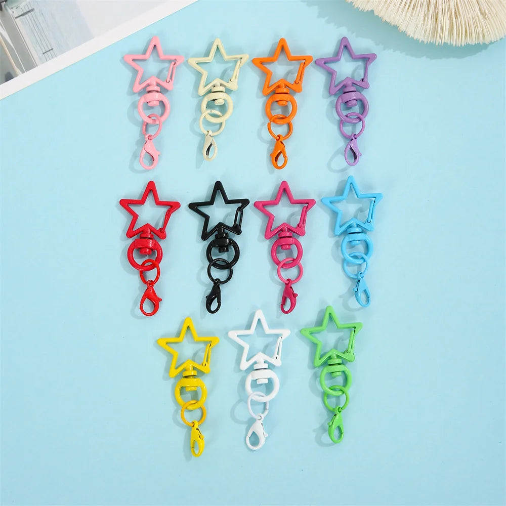 A collection of colorful lobster clasp keychains in various shades including pink, yellow, orange, purple, and blue.
