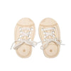 Pair of light wood lacing shoes used as a fine motor skills toy