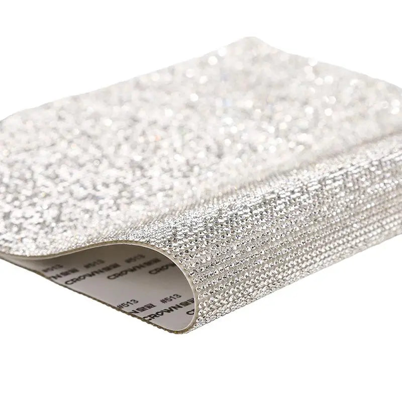 Roll of silver sparkling rhinestone adhesive tape for DIY crafts and decor
